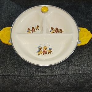 This item is a vintage Excello baby warming dish